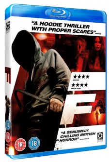F (2010) afişi
