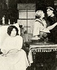 ın The Mesh Of Her Hair (1914) afişi